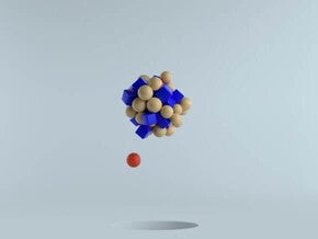 Uma bola vermelha paira sobre um buraco, enquanto formas de madeira e azuis flutuam acima, representando aminoácido taurina. 
